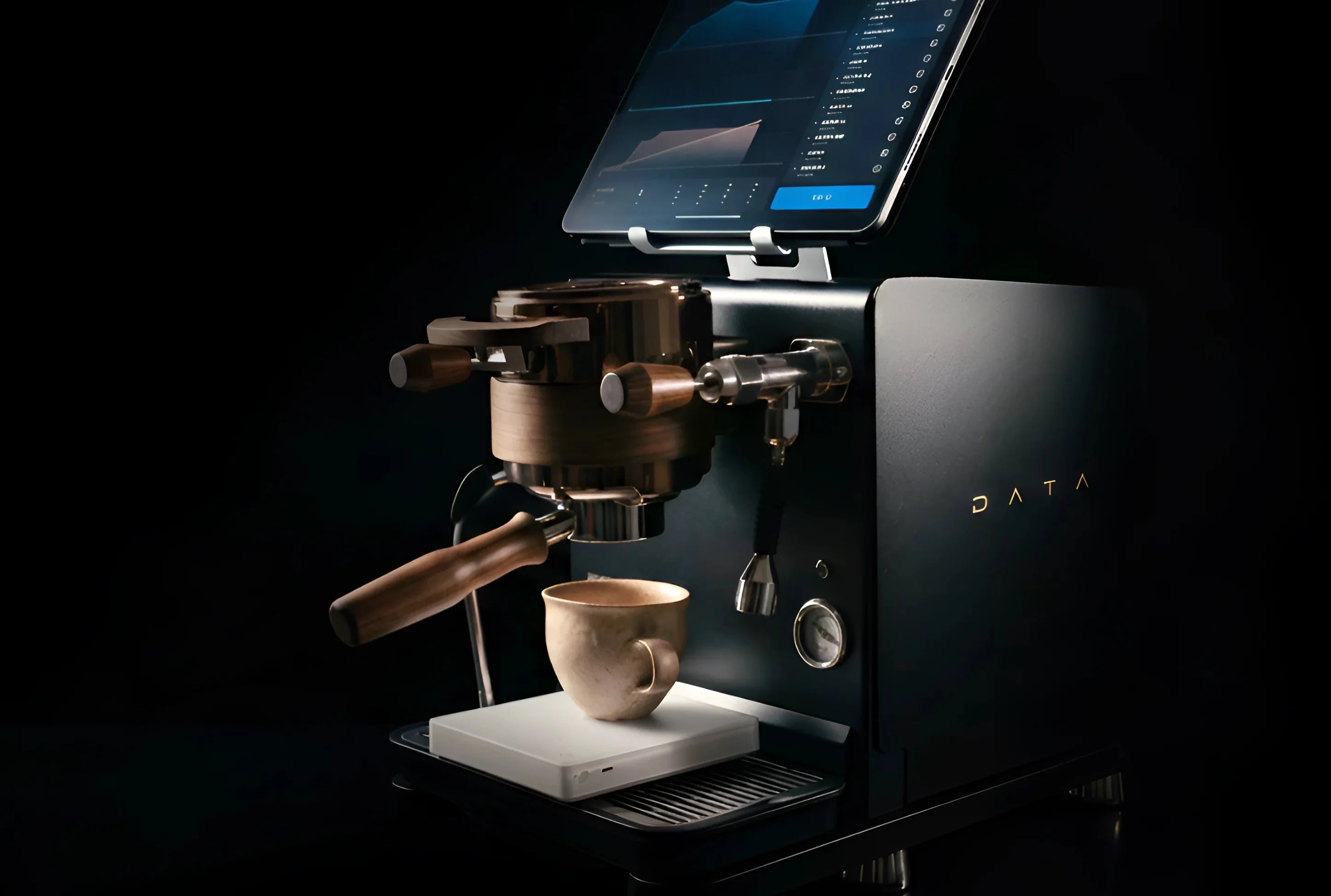 Wendougee DATA S espresso machine in Black with a coffee cup and touchscreen display in a dark setting