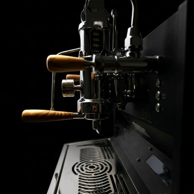 Close-up of ACS Vostok One Group Espresso Machine showcasing lever and polished chrome finish.