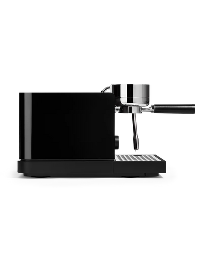 Fellow Espresso Series 1 Espresso Machine side view with portafilter attached, showcasing sleek design and precision.